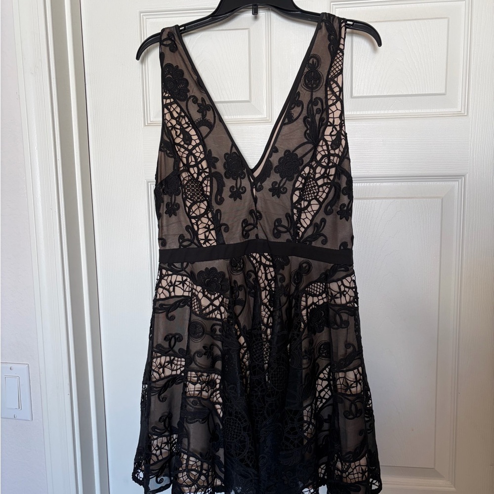 Bebe Tan and Black Apparel